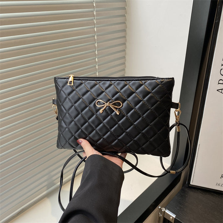 Damen elegante Clutch mit elegantem Steppmuster und zierlichem Schleifenakzent Nord Taschen