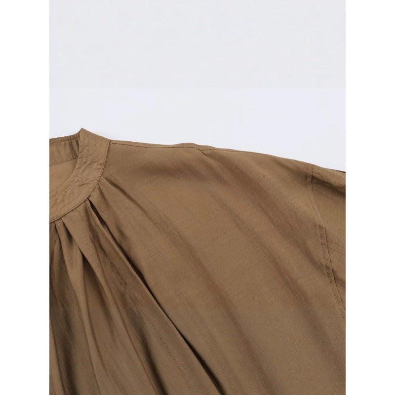 Damen Kurz geschnittene plissierte Blousonjacke mit Ballonärmeln und Smockbund Nord Taschen