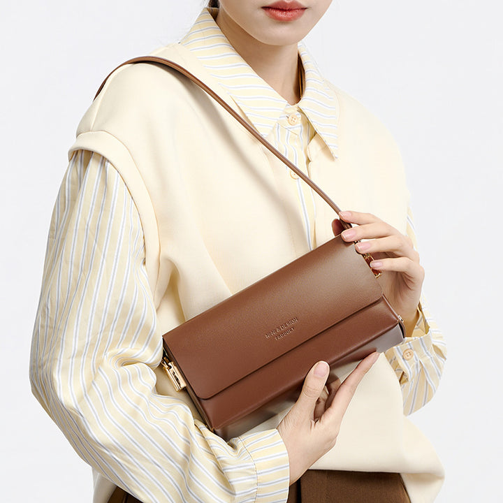 Damen elegante Lederumhängetasche mit minimalistischer Form Nord Taschen