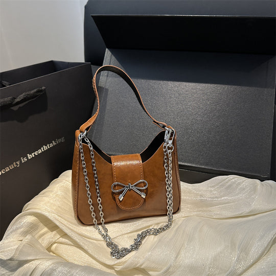 Damen-Handtasche mit verspieltem Schleifendetail und hochwertiger Kettenverzierung Nord Taschen