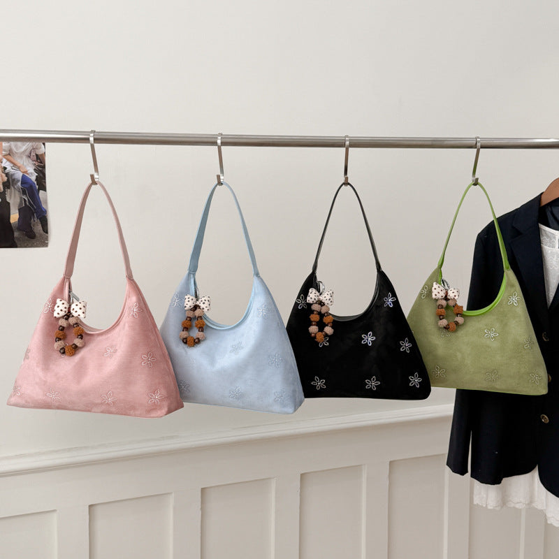 Damen Hobo-Tasche aus weichem Veloursleder mit funkelnden Applikationen Nord Taschen