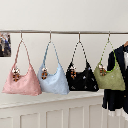 Damen Hobo-Tasche aus weichem Veloursleder mit funkelnden Applikationen Nord Taschen