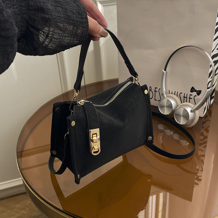 Damen Handtasche mit elegantem Reißverschluss und modernem Detail Nord Taschen