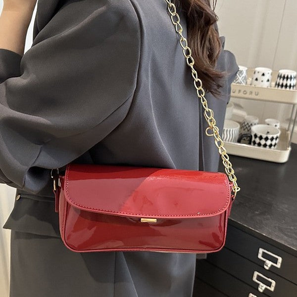 Damen elegante Clutch mit Kettenakzenten Nord Taschen