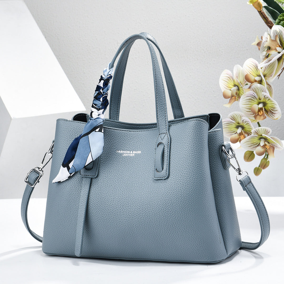 Damen elegante Handtasche mit dekorativem Schal Nord Taschen