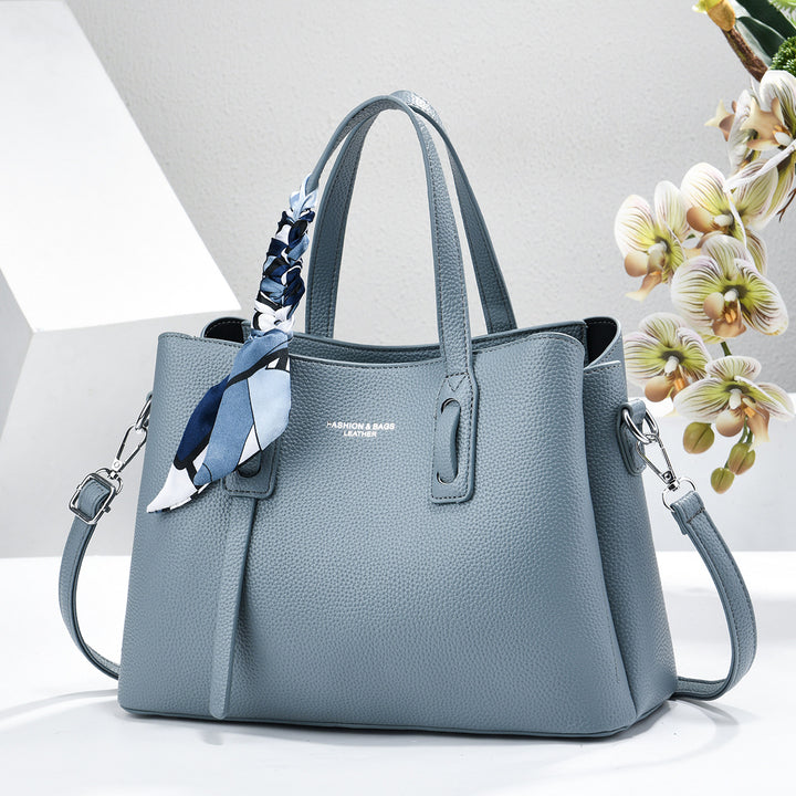 Damen elegante Handtasche mit dekorativem Schal Nord Taschen