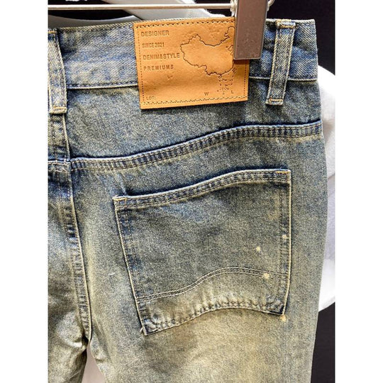 Herren Relaxed-Tapered Vintage-Jeans mit Paint‑Splatter, hohem Bund und umgeschlagenem Saum Nord Taschen