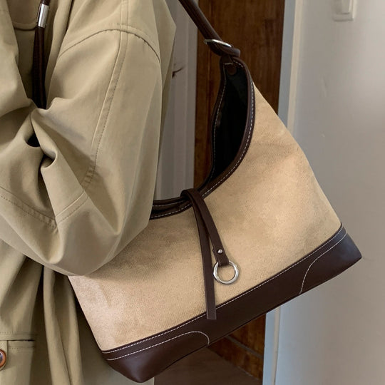 Damen Hobo-Tasche aus weichem Wildleder mit eleganter Silhouette und praktischen Fächern Nord Taschen