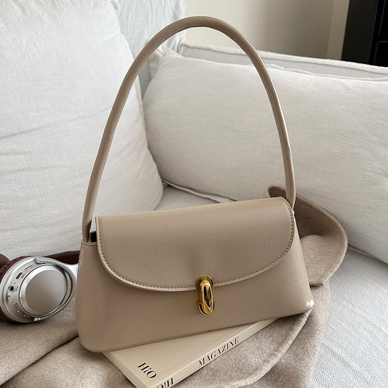 Damen elegante Handtasche mit geschwungenem Design und hochwertigem Kettenverschluss Nord Taschen