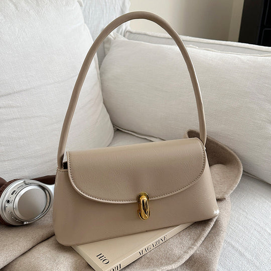 Damen elegante Handtasche mit geschwungenem Design und hochwertigem Kettenverschluss Nord Taschen