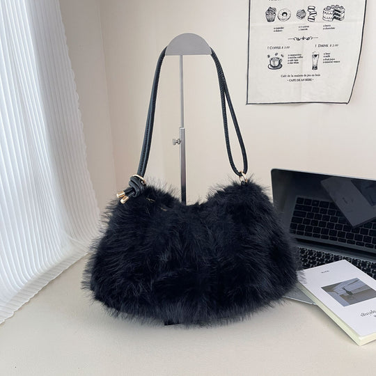 Damen Umhängetasche aus hochwertigem Kunstfell mit elegantem Detail Nord Taschen