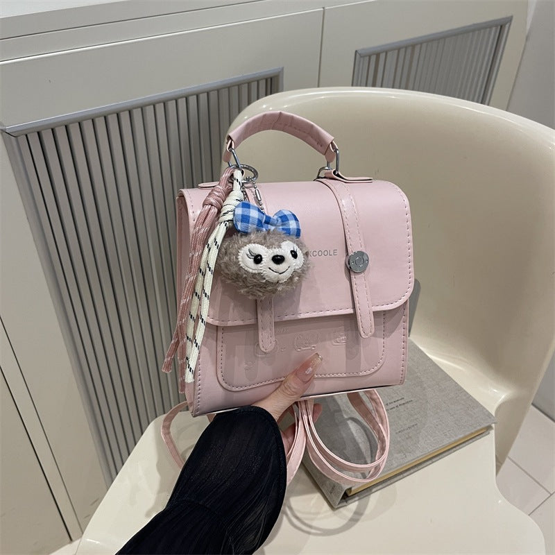 Damen modische Mini-Rucksacktasche mit verspieltem Anhänger Nord Taschen