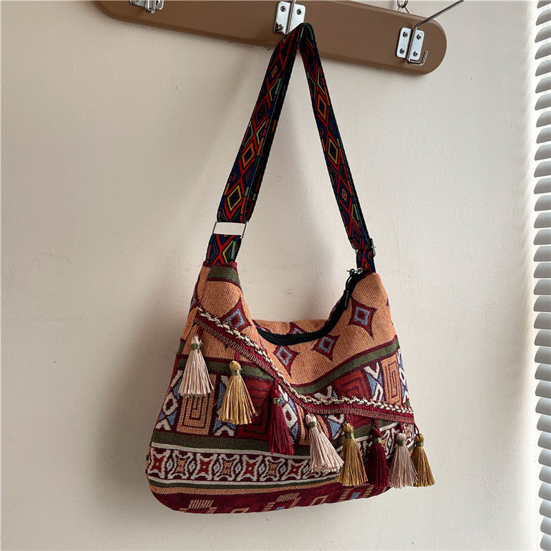 Damen Umhängetasche mit kunstvollem ethnischen Muster und dekorativen Quasten Nord Taschen