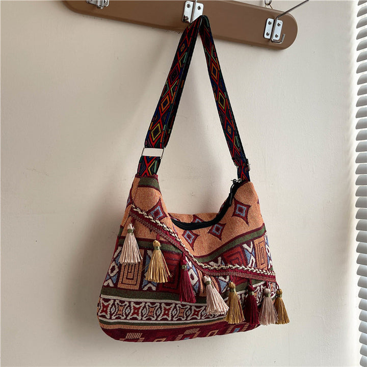 Damen Umhängetasche mit kunstvollem ethnischen Muster und dekorativen Quasten Nord Taschen