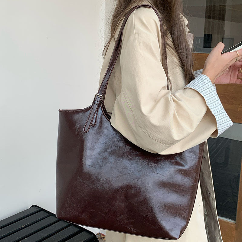 Damen elegante Tragetasche mit geschwungenem Design Nord Taschen