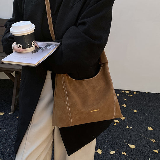 Damen schicke Hobo-Tasche aus weichem Wildleder mit dekorativen Nähten Nord Taschen