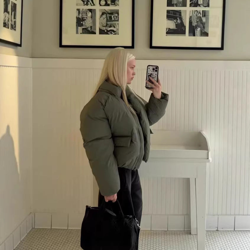 Damen Kurze boxy Funktionsjacke mit Kapuze, wattierter Isolierung und diagonalen Reißverschlusstaschen Nord Taschen