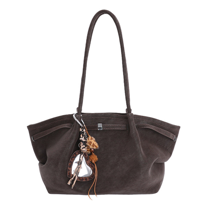 Damen Schultertasche aus hochwertigem Kunstleder mit dekorativem Anhänger Nord Taschen