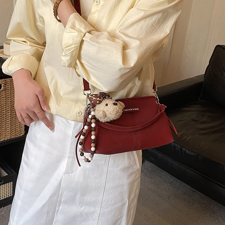 Damen Umhängetasche mit charmantem Tieranhänger Nord Taschen