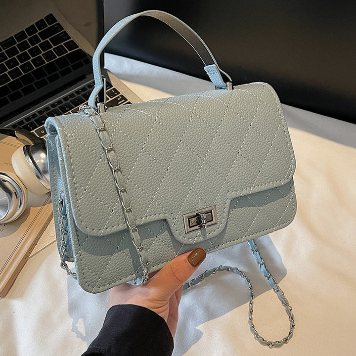 Damen Handtasche mit eleganter Steppung und schickem Metallverschluss Nord Taschen