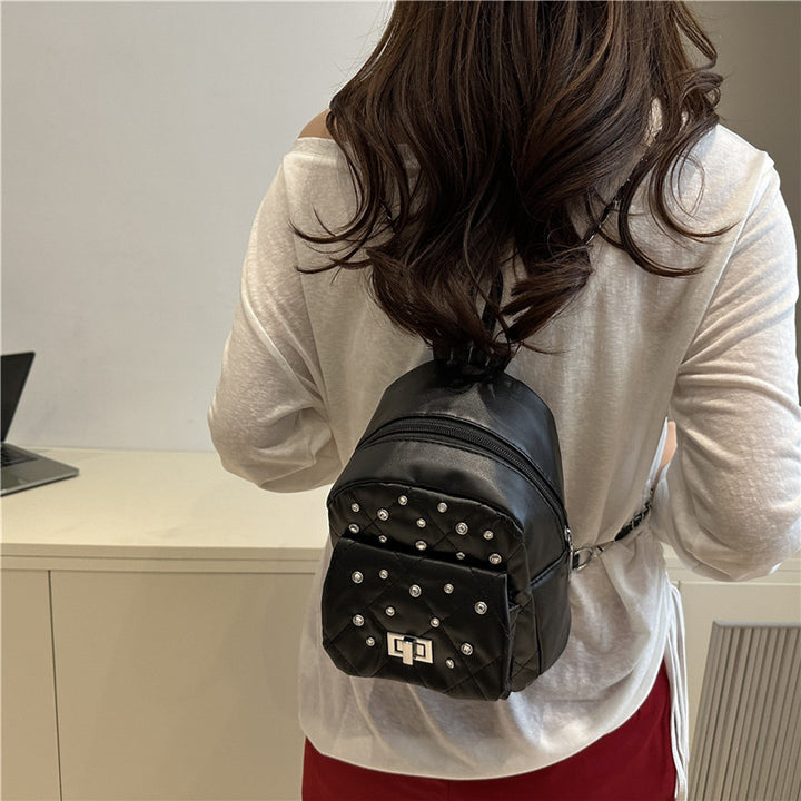 Damen Mini-Rucksackhandtasche mit eleganter Steppung und funkelnden Akzenten Nord Taschen