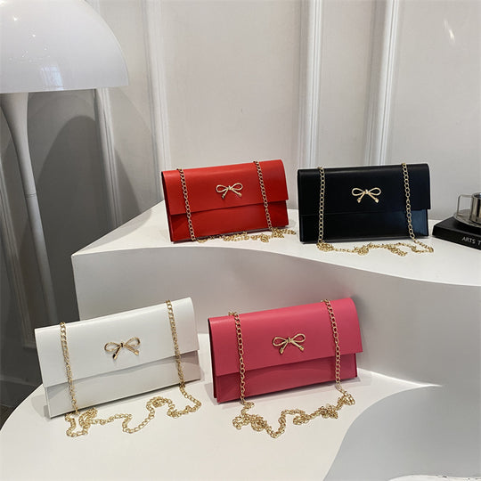 Damen elegante Clutch im minimalistischen Design mit goldenen Akzenten Nord Taschen