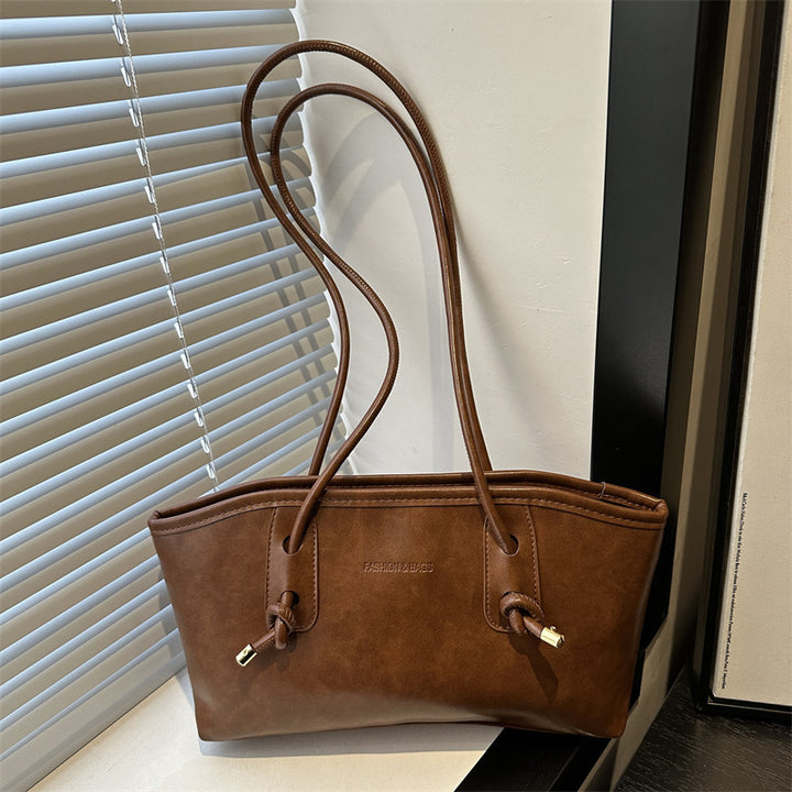 Damen Handtasche im minimalistischen Design mit edlen Akzenten Nord Taschen