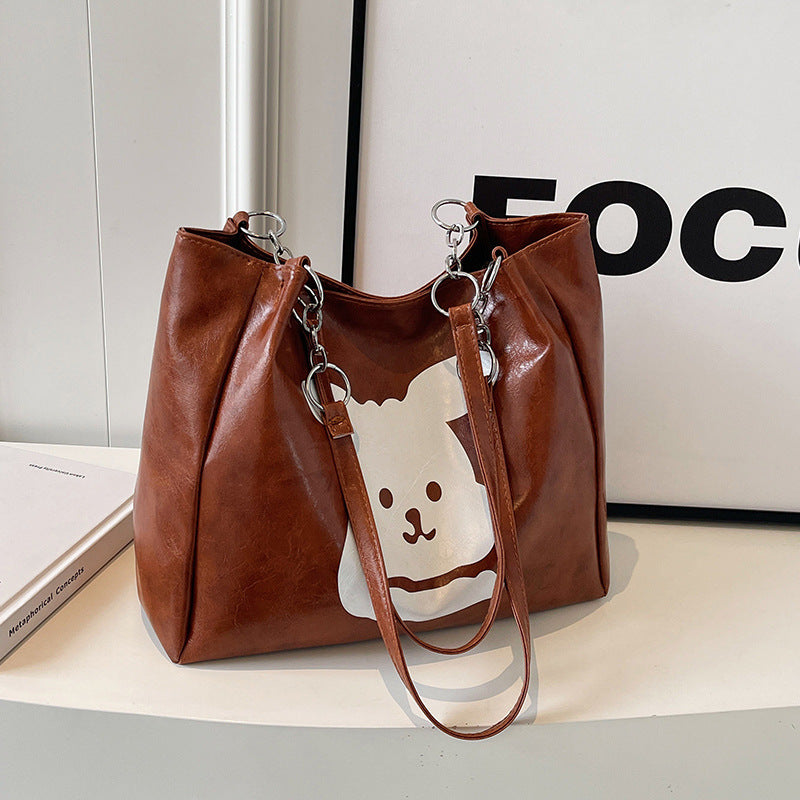 Damen Umhängetasche aus hochwertigem Kunstleder mit verspieltem Tierdesign Nord Taschen