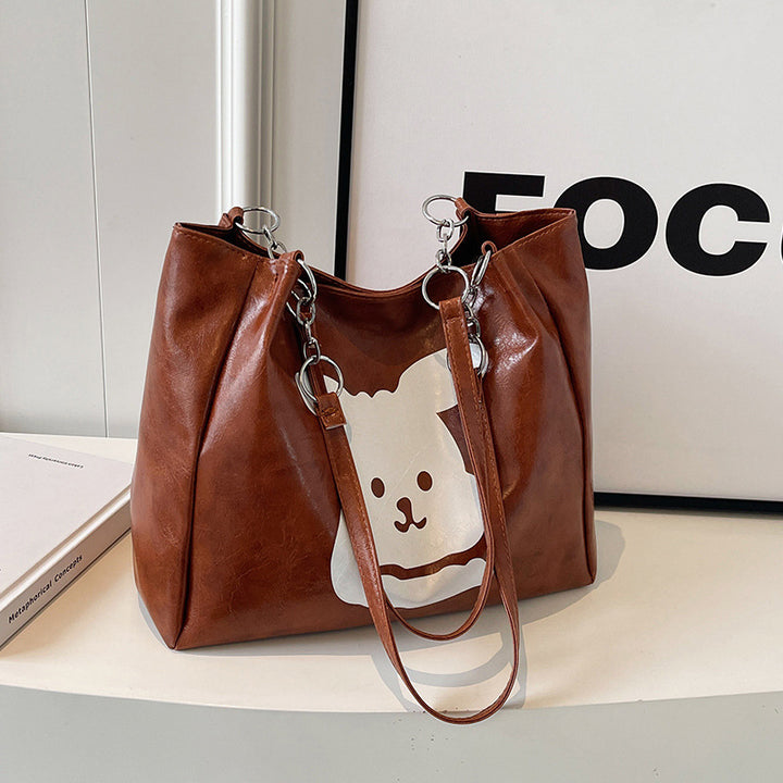 Damen Umhängetasche aus hochwertigem Kunstleder mit verspieltem Tierdesign Nord Taschen