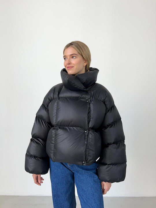 Damen extravagante Oversize Steppdaunenjacke mit extravoluminöser Kapuze Nord Taschen