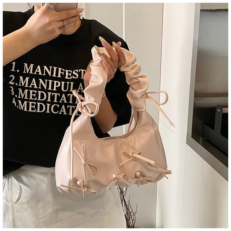 Damen Handtasche mit raffinierten Schleifen-Details und elegantem Tragegriff Nord Taschen
