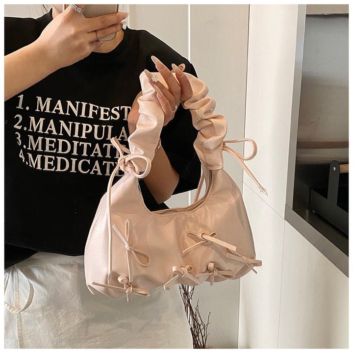 Damen Handtasche mit raffinierten Schleifen-Details und elegantem Tragegriff Nord Taschen