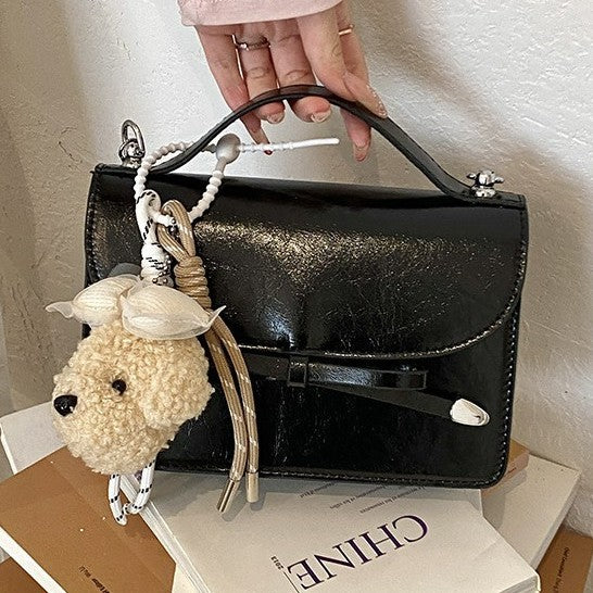 Damen elegante Mini-Handtasche mit niedlichem Anhänger Nord Taschen