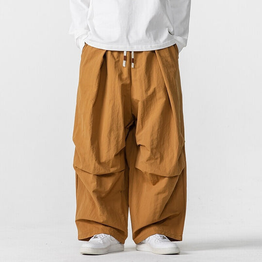 Herren Weite Utility-Loungehose mit überlappenden Falten und Kordelzugbund Nord Taschen