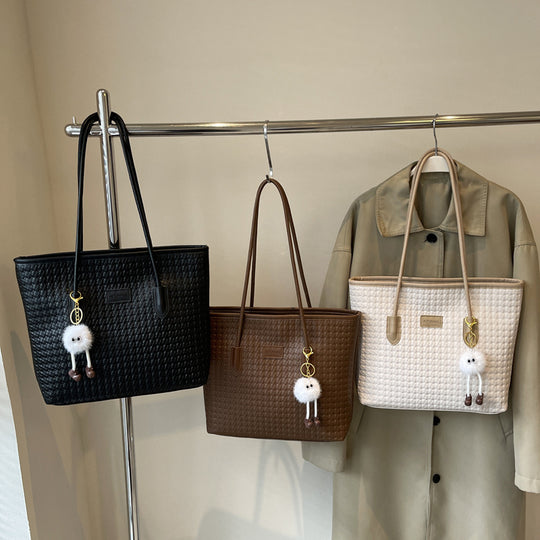 Damen Handtasche aus hochwertigem Flechtmaterial Nord Taschen