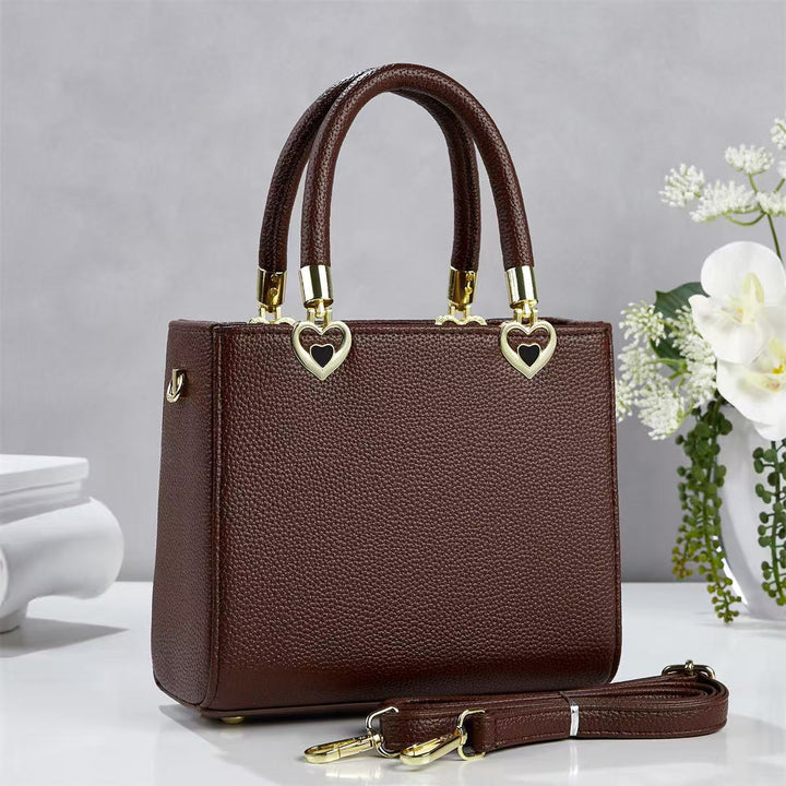 Damen stylische Handtasche mit schimmernden Herzanhängern Nord Taschen