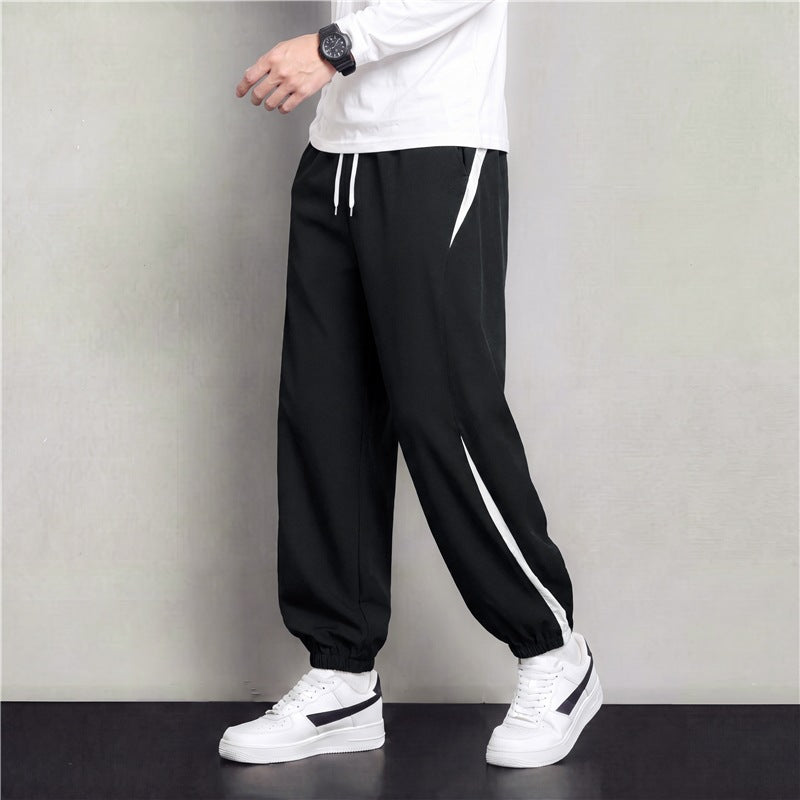 Herren Athleisure Jogginghose im Baggy‑Schnitt mit elastischem Bund, Tunnelzug und seitlichen Kontrastkeilen Nord Taschen