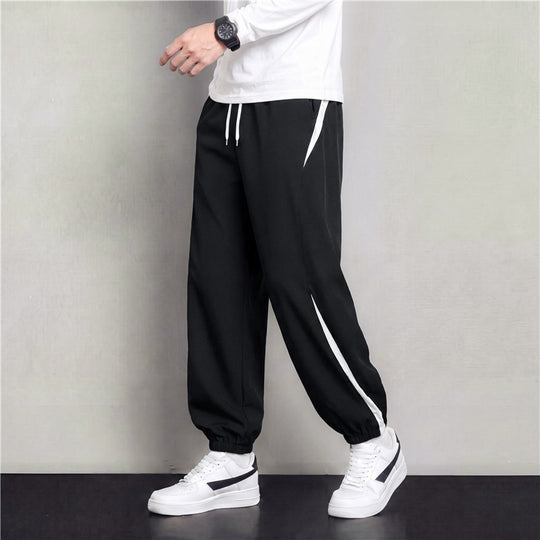 Herren Athleisure Jogginghose im Baggy‑Schnitt mit elastischem Bund, Tunnelzug und seitlichen Kontrastkeilen Nord Taschen