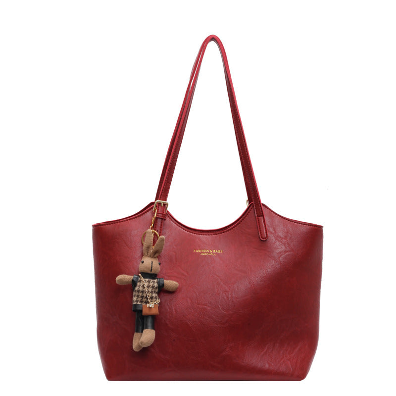 Damen große Handtasche mit verspieltem Stoffanhänger Nord Taschen