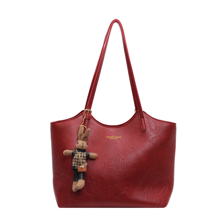 Damen große Handtasche mit verspieltem Stoffanhänger Nord Taschen