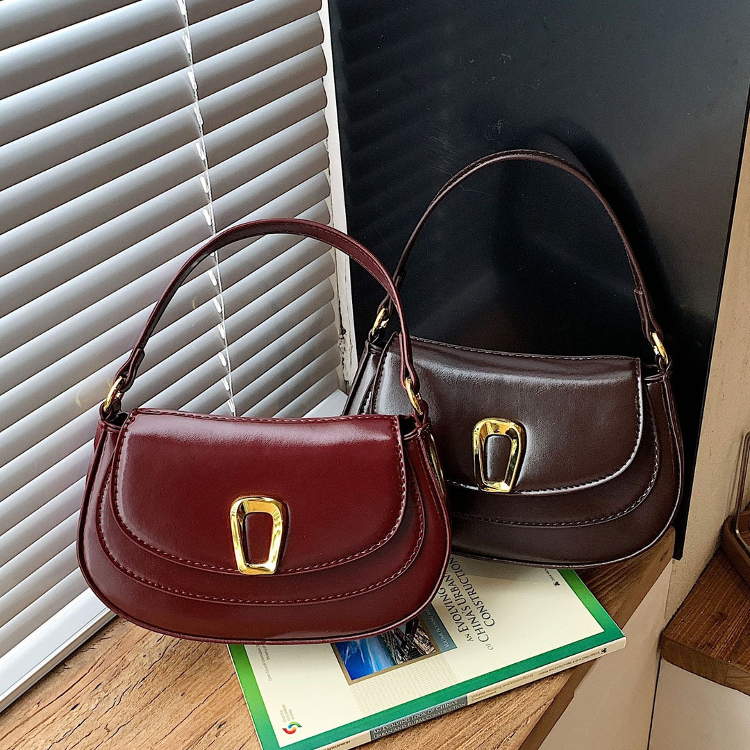 Damen Schultertasche mit elegantem Kettenverschluss und modischer Form Nord Taschen