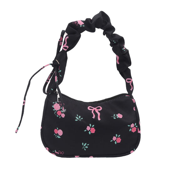 Damen modische Abendtasche mit verspielten Rüschen und floralen Akzenten Nord Taschen