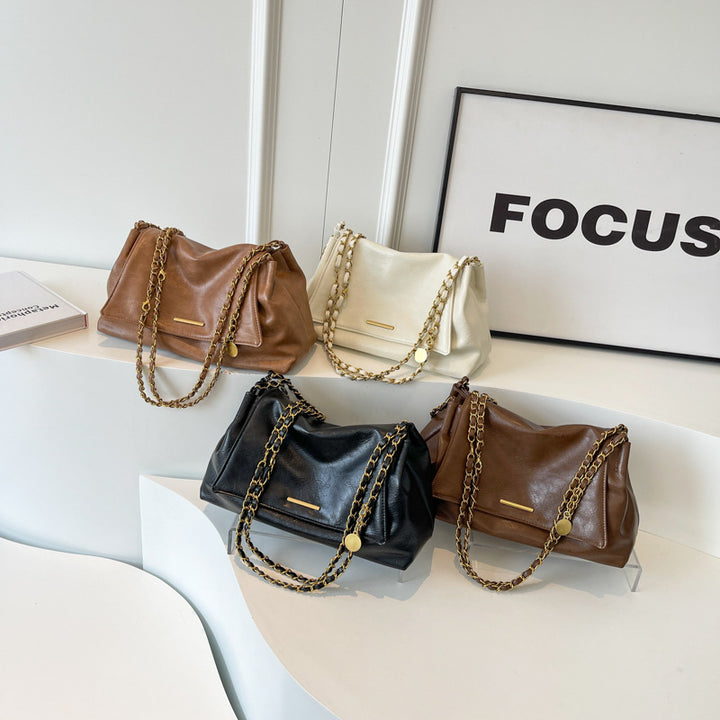 Damenhandtasche mit luxuriösem Kettenhenkel und weich strukturierter Oberfläche Nord Taschen