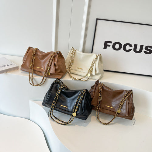 Damenhandtasche mit luxuriösem Kettenhenkel und weich strukturierter Oberfläche Nord Taschen