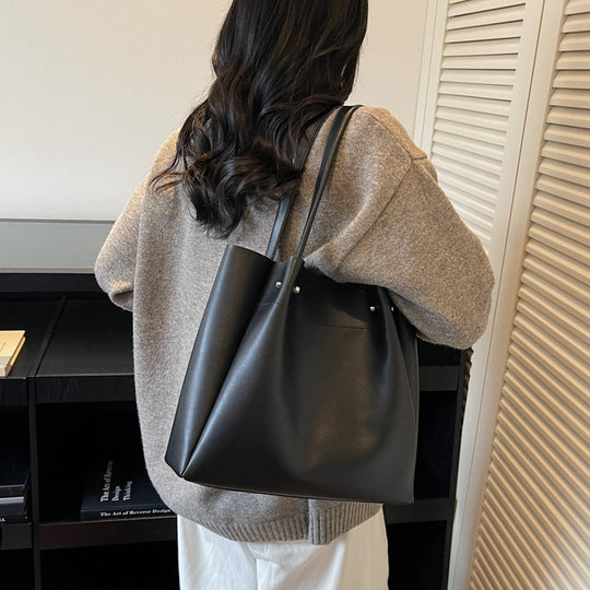 Damen elegante Tragetasche mit feinem Kunstleder und goldenen Akzenten Nord Taschen