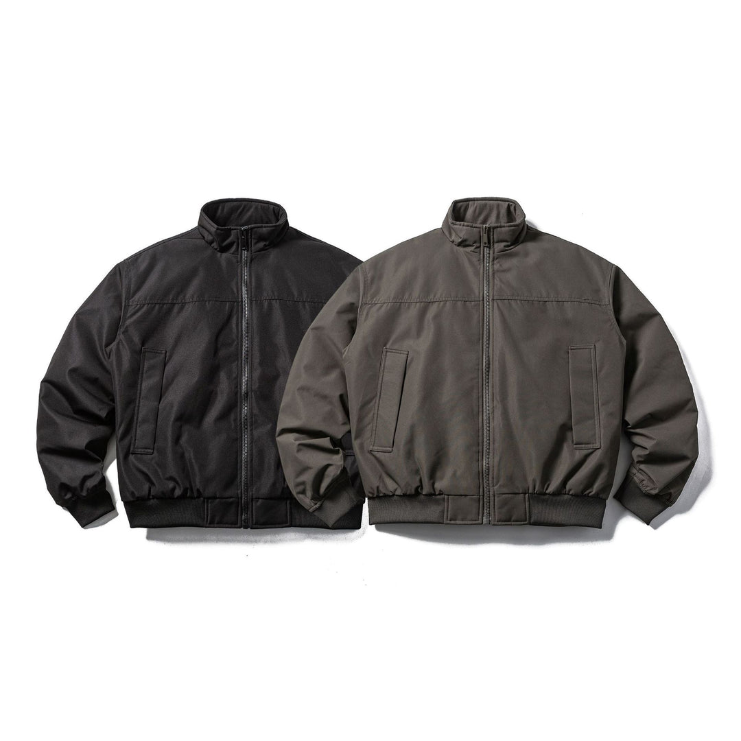 Herren Wattierte Bomberjacke im Boxy‑Cut mit hohem Stehkragen und geripptem Bund Nord Taschen