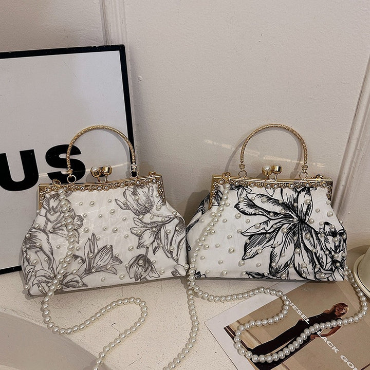 Damen Clutch-Tasche mit perlverziertem Blumenmuster und elegantem Metallverschluss Nord Taschen