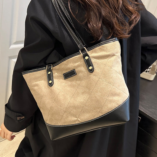 Damen elegante Handtasche mit gestepptem Design und praktischen Seitentaschen Nord Taschen