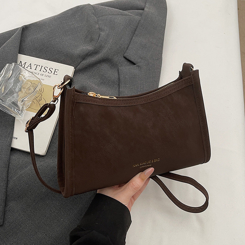 Damen Umhängetasche aus hochwertigem Kunstleder mit elegantem Reißverschluss Nord Taschen