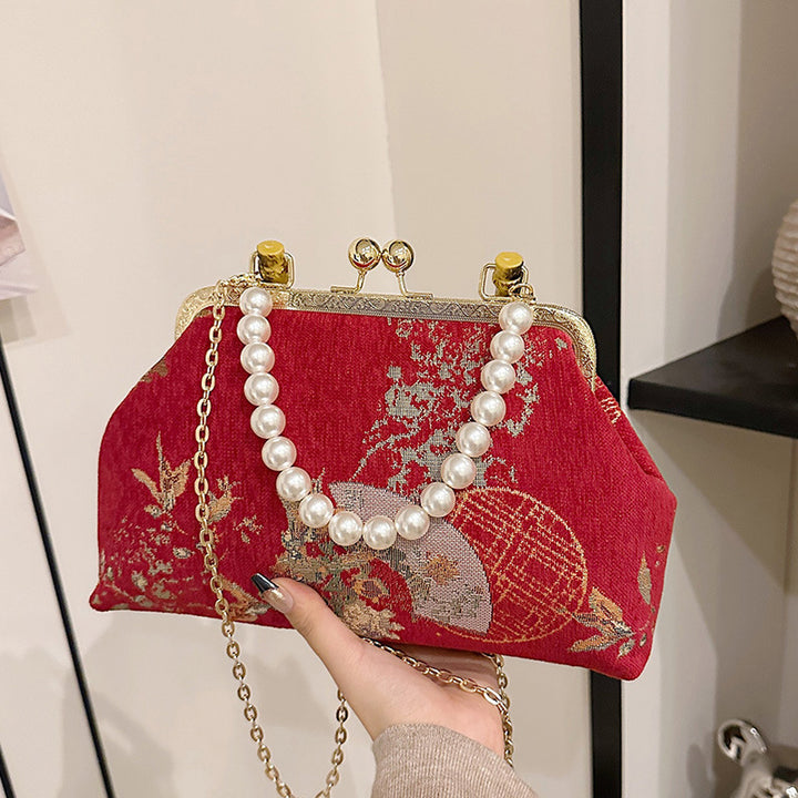 Damen elegante Umhängetasche mit kunstvollem Perlenverschluss Nord Taschen
